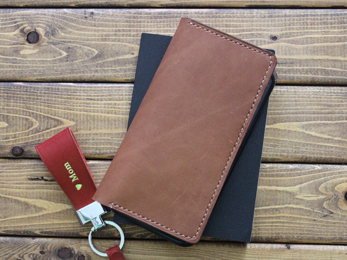 Full Grain Brown leather hand stitched phone wallet with tan stitching