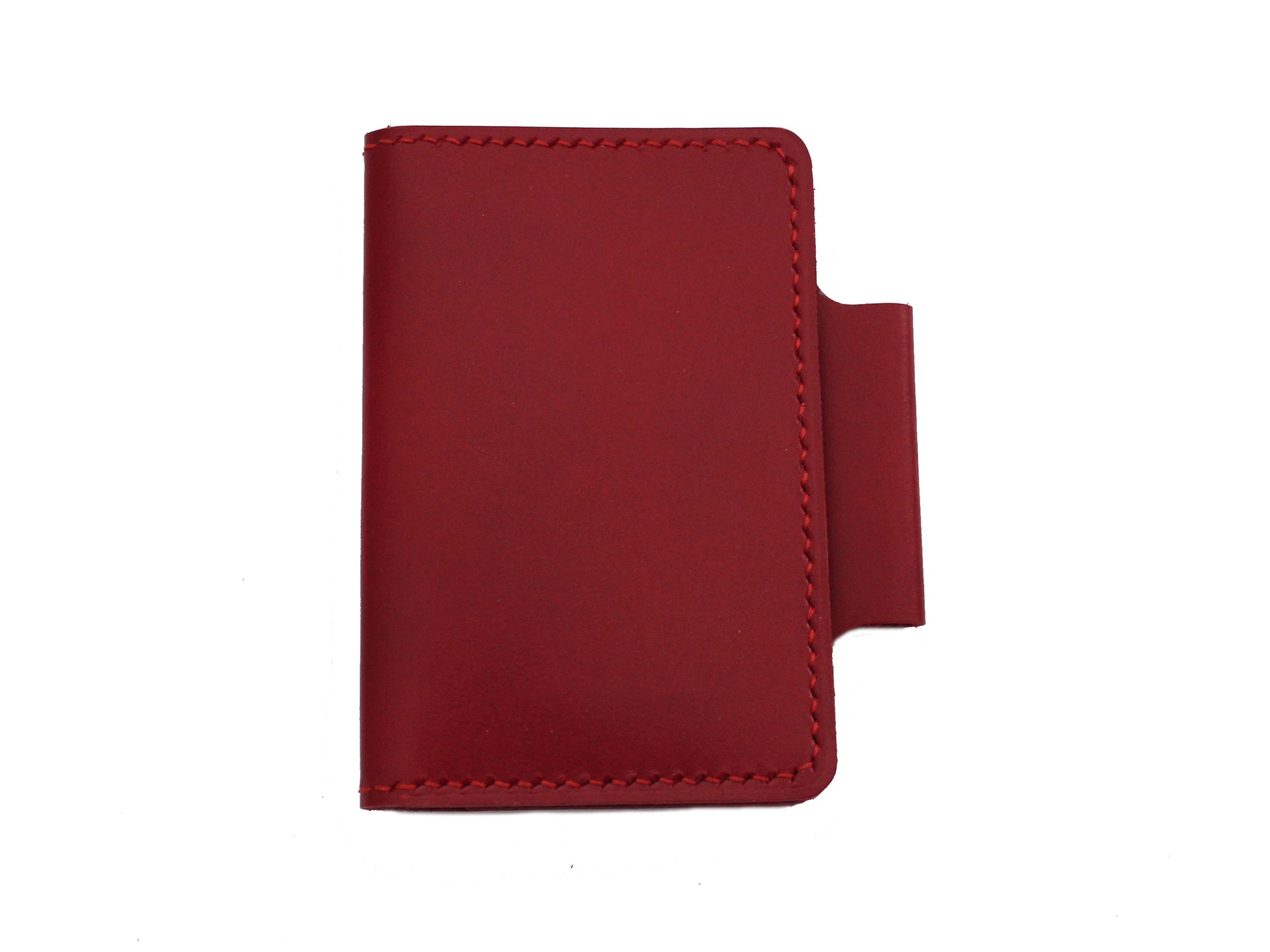 A red folio pocket journal wallet made of premium Italian leather with a pen loop