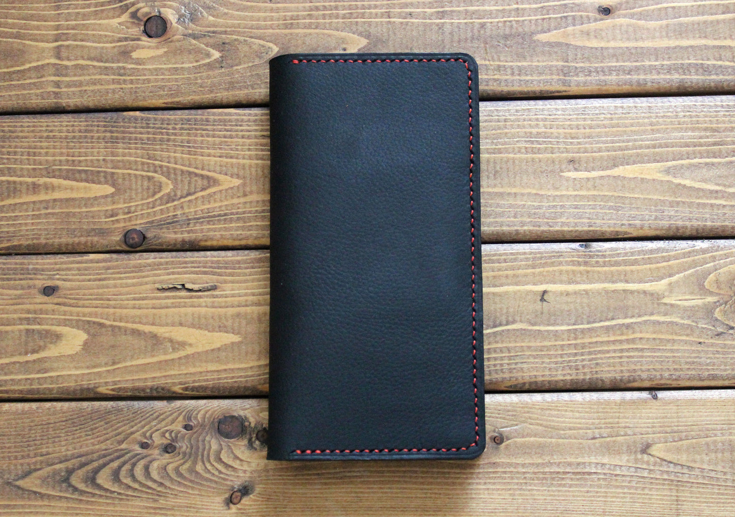 full grain Black leather phone case  with red stitching