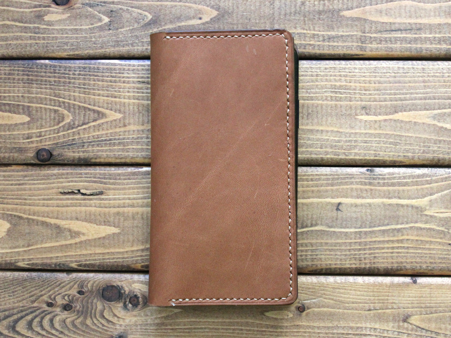 Full Grain Brown leather hand stitched phone wallet with tan stitching